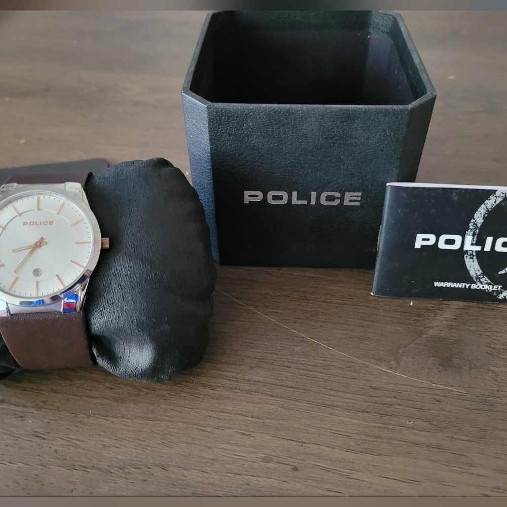 Police Watch New with original box never worn.